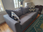 Complete your home with this gray sofa