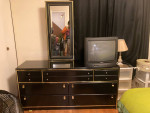 black and gold bedroom set and teak sofa