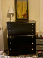 black and gold bedroom set and teak sofa