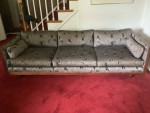 black and gold bedroom set and teak sofa
