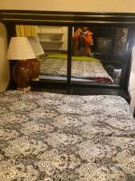black and gold bedroom set and teak sofa
