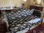 Camelback Sofa with carved wood detail