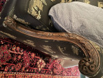 Camelback Sofa with carved wood detail