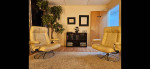 2 matching Ekornes chairs with ottomans, West Elm sofa
