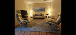 2 matching Ekornes chairs with ottomans, West Elm sofa