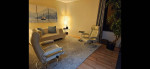 2 matching Ekornes chairs with ottomans, West Elm sofa