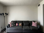 L-shaped modular sofa with ottoman
