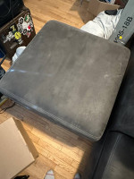 3 piece sofa, ottoman, and rug.
