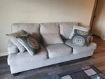 Sofa includes 4 decorated pillows
