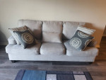 Sofa includes 4 decorated pillows