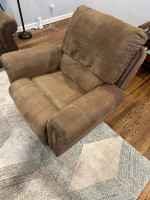 Matching taupe/light brown faux leather nailhead sofa and rocking recl