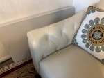 86" Ivory Tufted Leather Sofa Excellent condition