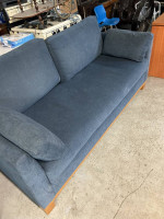Blue upholestered sofa very clean