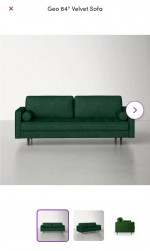 Emerald green velvet sofa