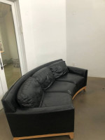 leather couch curved black sofa
