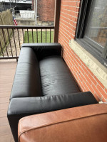 small black leather sofa
