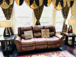 Reclining leather sofa and love seat for sale