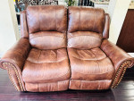 Reclining leather sofa and love seat for sale