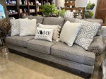 New in plastic ashley furniture einsgrove sofa
