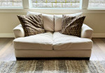 Large off-white cream loveseat sofa