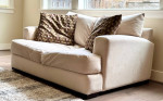 Large off-white cream loveseat sofa