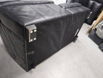 Jeromes black genuine leather sectional sofa
