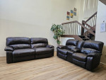 Genuine Leather Power Reclining Sofa And Loveseat Set.