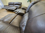 Genuine Leather Power Reclining Sofa And Loveseat Set.