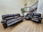 Genuine Leather Power Reclining Sofa And Loveseat Set.