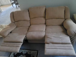 Sofa and love seat all 4 sides recliner almost New!