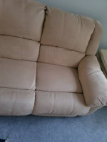 Sofa and love seat all 4 sides recliner almost New!
