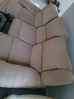 Sofa and love seat all 4 sides recliner almost New!