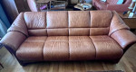 Model: Oslo 4-Seat Sofa; caramel color leather with Walnut stain wood