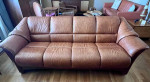 Model: Oslo 4-Seat Sofa; caramel color leather with Walnut stain wood