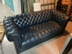 Dark blue leather Chesterfield sofa