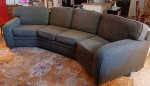Custom upholstered curved sofa