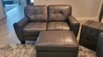 Grey leather sofa loveseat and matching ottoman