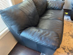 Black sofa and love seat