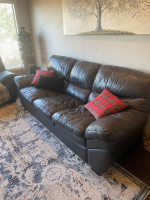 Black sofa and love seat