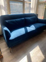 Blue velvet sofa