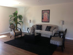 Grey and Black Armchairs and Sofa