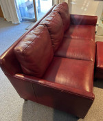 Reduced! Beautiful, well-made burgundy leather sofa and ottoman