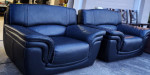 2 LIKE NEW GENUINE LEATHER OVERSIZED SOFA CHAIRS/SCANDINAVIAN DESIGNS