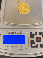 18 K gold charm