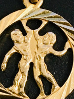 Gold charm pendant