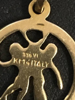 Gold charm pendant