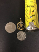 Gold charm pendant