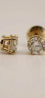 18K yellow gold bezel .80 ctw round diamonds.