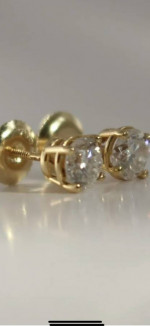 18K yellow gold bezel .80 ctw round diamonds.