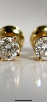 18K yellow gold bezel .80 ctw round diamonds.